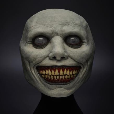Smiling demon mask